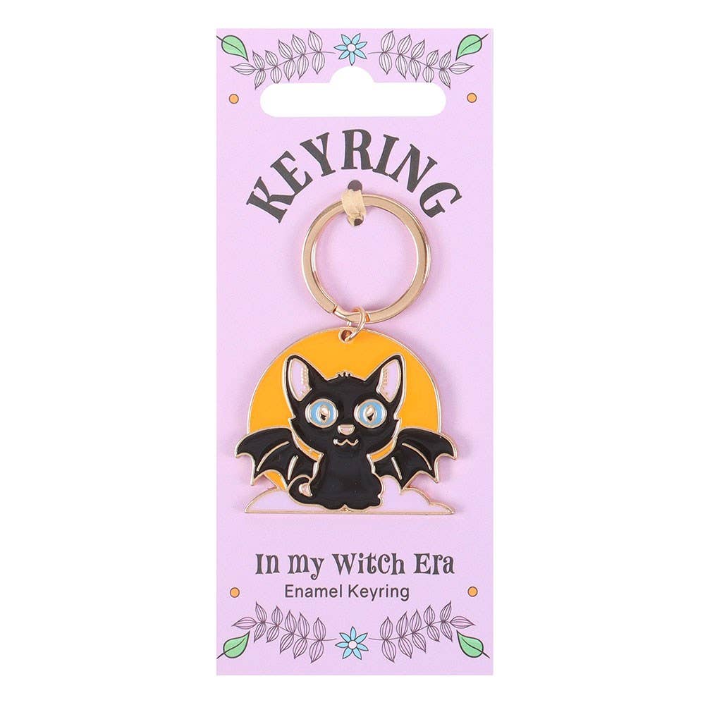 In my Witch Era Bat Cat, and Moon Enameled Keyring